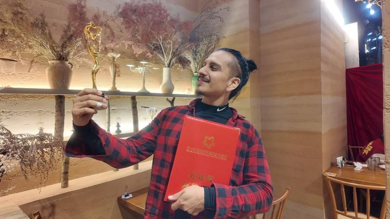 �ֶ��ز���̾�����񽱡�